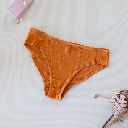 The Darcy - Orange Modal Brief